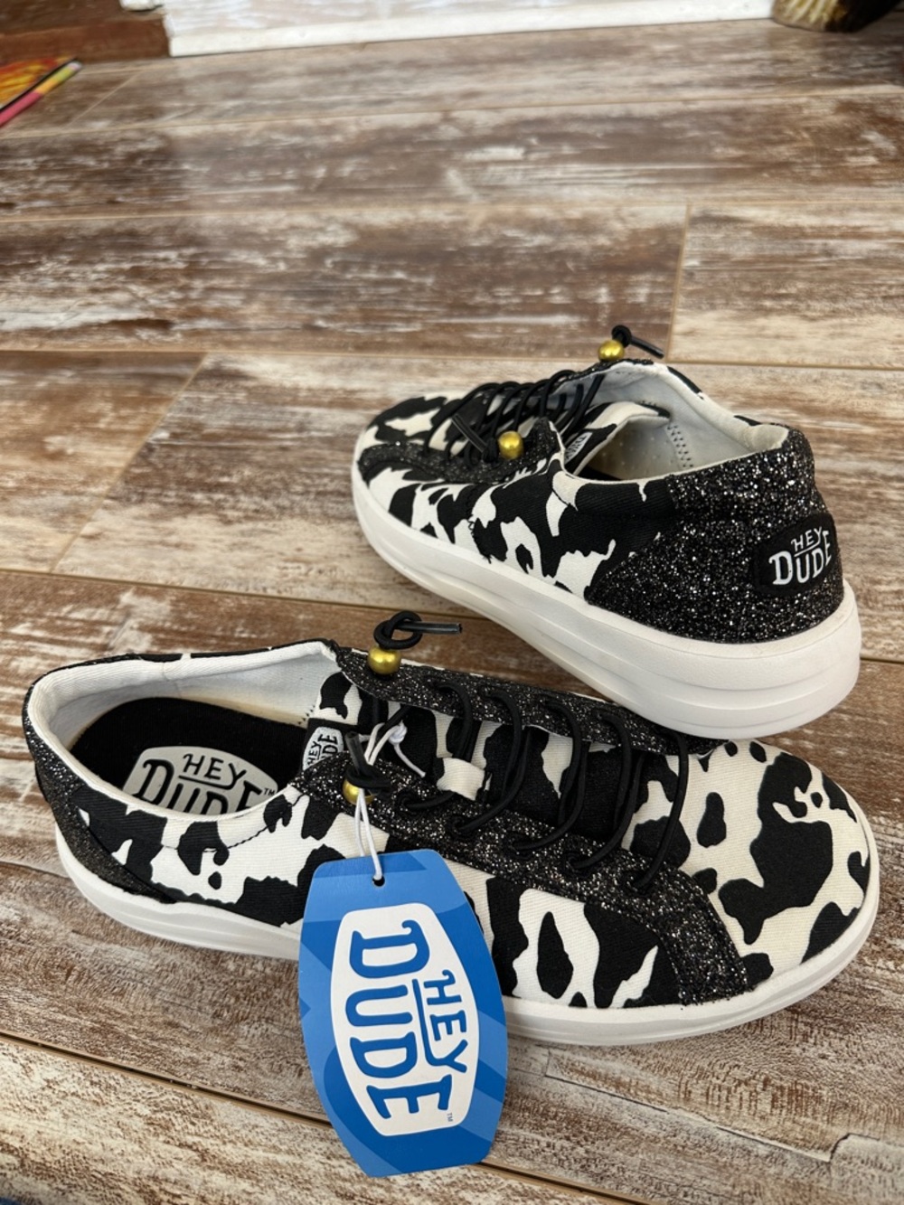 NWT Hey Dude Karina Cow Black with Glitter Sneakers